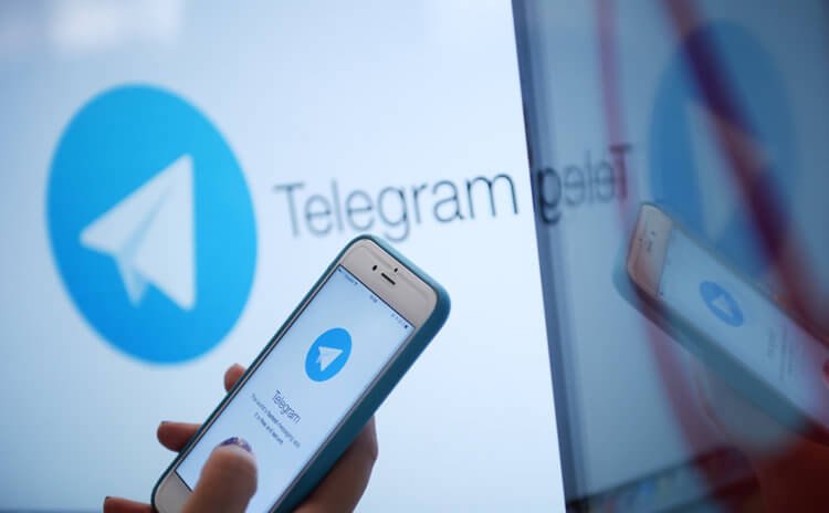 How to add a photo to an already written message in Telegram on Android